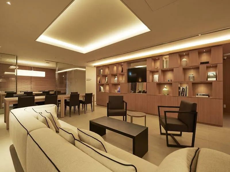 Отель First Cabin Kyobashi Токио Япония
